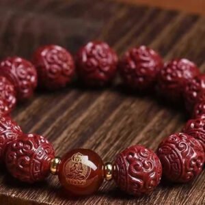 Buddha jewelry:The Raw Cinnabar Bracelet, or Zodiac Buddha Bracelet, features raw cinnabar beads paired with twelve zodiac animal beads, red agate accents, and symbols of the Eight Guardians. Raw cinnabar offers protection, while zodiac beads and the Zodiac Buddha connection personalize the piece. Red agate adds vitality, and the Eight Guardians provide balanced protection. Crafted with intention, it serves as both a spiritual talisman and a striking accessory, rich in cultural and symbolic depth.