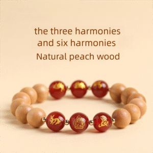 Buddha jewelry:The Natural Peach Wood and Red Agate Bracelet, featuring the zodiac sign's Benming Buddha and the three harmonies and six harmonies of the Chinese zodiac, is designed for one's zodiac year. Peach wood offers protection, red agate brings vitality, and Benming Buddha provides divine guidance. The inclusion of harmonious zodiac relationships balances energies, making it a powerful talisman for luck, stability, and cultural connection during this significant period.