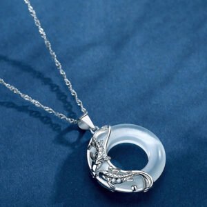 Buddha jewelry:The Lucky Koi Cat's Eye Stone Necklace features a mesmerizing cat's eye stone with a lucky koi motif, symbolizing fortune and resilience. The Sterling Silver Peace Buckle Jade Silver Pendant combines sterling silver's elegance with jade's serenity, representing peace and balance. Both are exquisite, meaningful accessories with versatile styling.