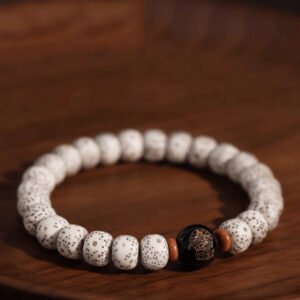 Buddha jewelry:The Natural Star Moon Bodhi Barrel Bead Bodhi Seed Bracelet is a prayer beads bracelet featuring Star Moon Bodhi barrel beads, along with the 12 Chinese Zodiacs and Zodiac Protective Buddhas. The Bodhi seeds symbolize spiritual awakening, while the zodiac beads represent personal identity and the Protective Buddhas offer divine guidance. Crafted with care, it serves as both a devotional tool and a meaningful accessory, growing more beautiful with time as a reflection of the wearer’s spiritual journey.